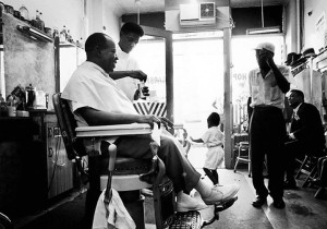 Louis Armstrong gets a haircut in his local barbershop in Queens, New York, circa 1965 (LIFE Magazine)